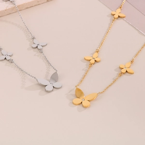 Elegant gold and silver stainless steel butterfly necklaces set with crystal accents