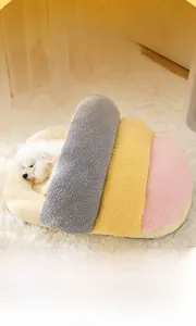 Macro view of warm plush semi-enclosed cloud pet bed with soft multi-color stitch texture