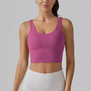 Detailed front view of high-stretch V-back sports bra in magenta with wide shoulder straps