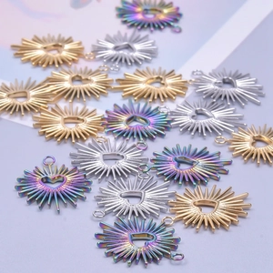 Polished stainless steel heart pendants in gold, silver, and rainbow finishes for DIY jewelry