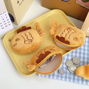Cute taiyaki-shaped plush coin purse and small wallet with soft yellow fuzzy fabric