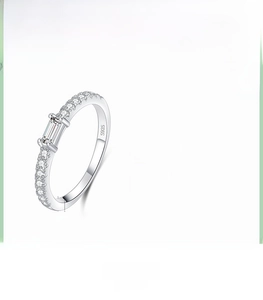 Detail showing S925 hallmark on minimalist silver ring with sparkling zirconia stones