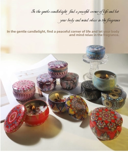 Detailed shot of soy wax candles in mandala patterned metal tins with dried flowers