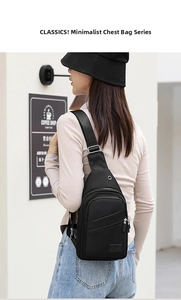 Rear view of a black multi-functional oxford chest bag with wide adjustable shoulder strap