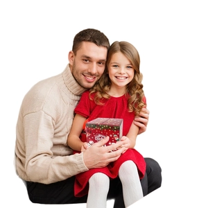 Father and daughter holding a red Merry Christmas cash gift box for party decorations