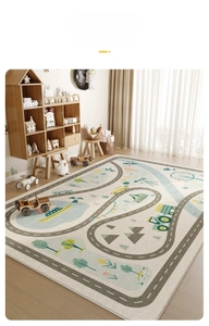 Detail of soft kid carpet with cartoon road and car map in a cozy play area