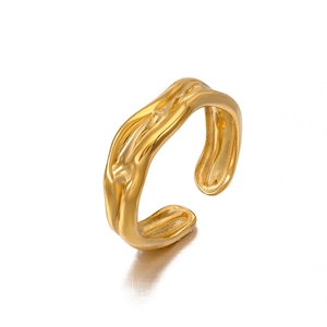 Minimalist gold irregular lava textured open ring with liquid metal style finish