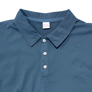 Detailed view of blue polo shirt neckline featuring three-button placket and collar
