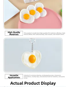 Macro detail of heart-shaped fried egg keychain made of high-quality PVC material