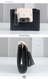 Detail view of compact floral wallet featuring cat-shaped clasp and multiple card slots