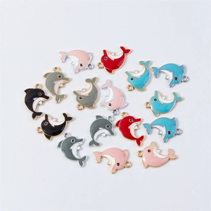 Colorful enamel dolphin charms for DIY jewelry making in various vibrant metal finishes