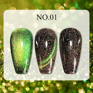 Close-up of sparkling cat-eye nail polish with glittering green and emerald crystal effect