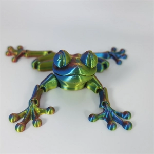 Detailed macro view of 3D printed articulated frog with iridescent multicolor gradient finish