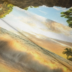Gros plan du tissu doux de la tapisserie avec impression de paysage de plage au coucher du soleil