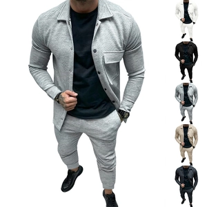 Macro detail showing the waffle texture fabric and chest pocket of this men's casual set