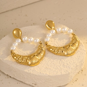 Golden croissant-shaped stainless steel earrings with elegant white pearl charms