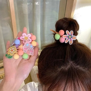 Floral hair ties for girls in macaron colors, showing product detail and ponytail styling