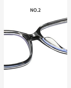 Macro detail of the integrated nose pads and frame bridge of black anti-blue light glasses
