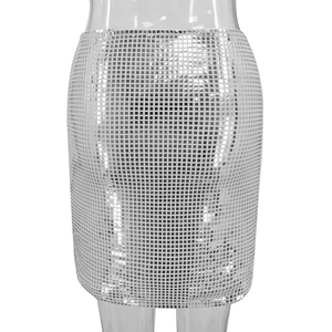 Detailed close-up of shiny silver sequins in a grid pattern on a slim mini skirt