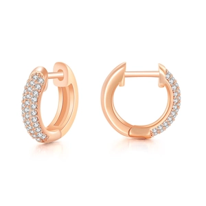 Close-up of rose gold pavé hoop earrings with micro-set cubic zirconia on white background