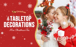 Cozy holiday scene with a mother and child holding a mini festive tabletop Christmas tree