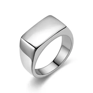 Minimalist silver men's signet ring with a polished rectangular flat surface in stainless steel