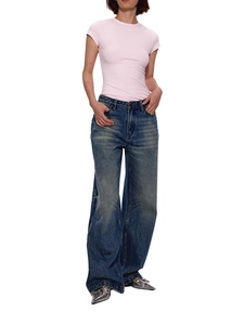 Slim fit modal t-shirt and wide leg blue jeans styled with silver pointed toe heels