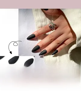 Matte black almond-shaped press-on nails with a frosted texture for a sleek look