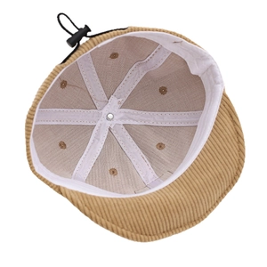Inside view of baby corduroy cap with adjustable drawstring and khaki ribbed texture