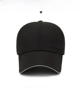 Detail view of black breathable mesh baseball cap with reflective brim for summer sport