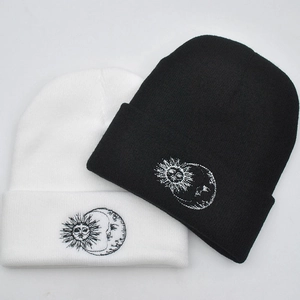 Winter knitted beanies with sun and moon embroidery for outdoor windproof warmth