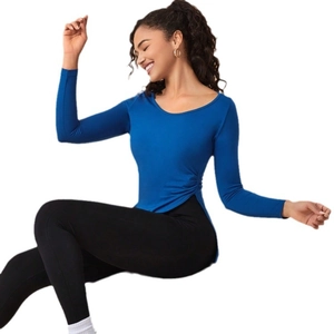 Slim fit long sleeve yoga top in royal blue paired with black high waist leggings