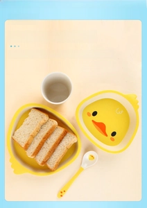Bamboo fiber duck-shaped plates set with a spoon and cup for kids feeding