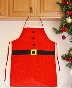 Detail of red Santa apron with black belt pattern and white trim in a festive setting