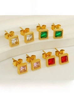 Detailed macro view of titanium steel square zircon earrings in four distinct colors