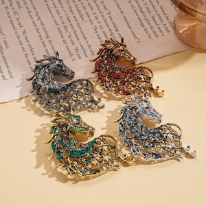 Vintage hollow horse head brooches with colored rhinestones in gold and silver plating