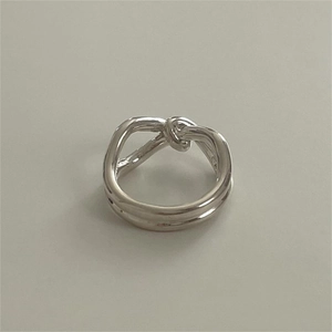 Minimalist 925 sterling silver knotted ring with polished double bands and woven texture