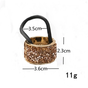Detail showing dimension marks and champagne rhinestone encrusted round ponytail holder