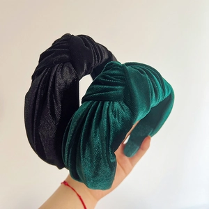 Chic knotted velvet wide headbands in black and emerald green colors for women