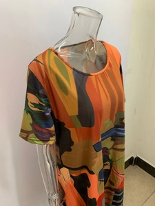 Detail of multi-color abstract print on a short-sleeve summer dress fabric