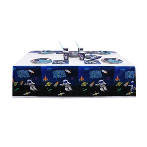 Detailed outer space party set with astronaut plates, napkins, and astronaut tableware