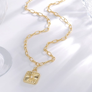 Vintage gold square sunburst pendant necklace with white opal and long link chain