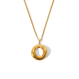 Macro detail of high-quality gold circular heart pendant necklace on white background