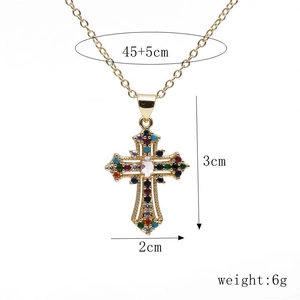 Detail of gold cross pendant with colorful gemstones and dimensions 45+5cm chain length