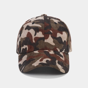 Detail of camouflage corduroy baseball cap showing texture and six-panel stitching