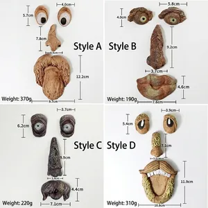 Luminous resin tree face garden ornaments in four distinct styles on white background