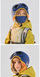 Detail of kids winter aviator hat with goggles and fleece mask in blue and yellow