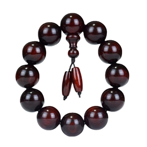 Red sandalwood prayer beads with 12 large round beads and visible natural wood grain