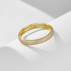 Detailed close-up of 925 hallmark on gold plated eternity ring with micro-pave zircons