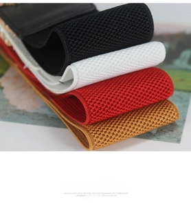 Detailed texture of elastic waist belts in black, white, red, and khaki colors